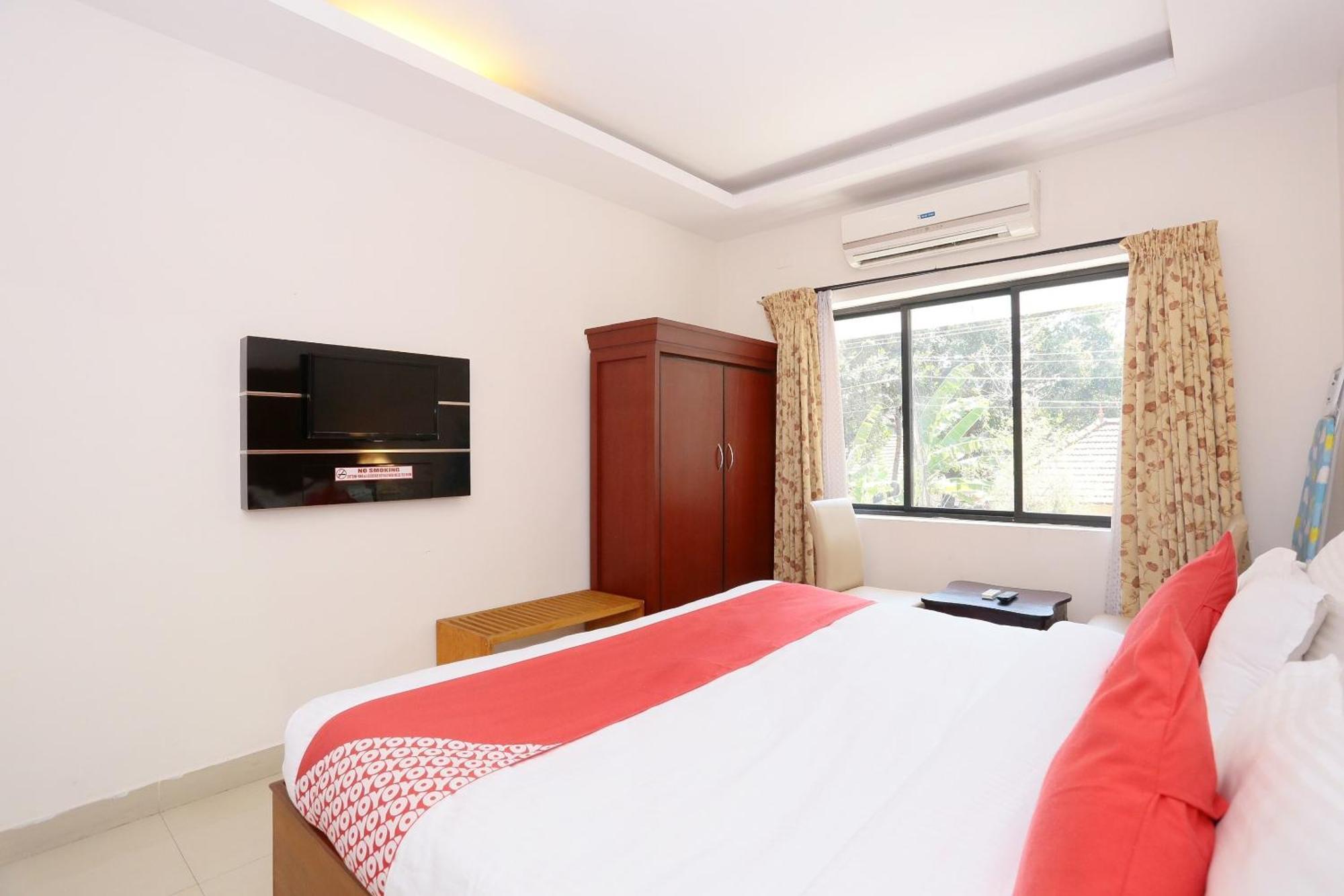 Hotel Super Townhouse Dona Castle à Kollam Extérieur photo