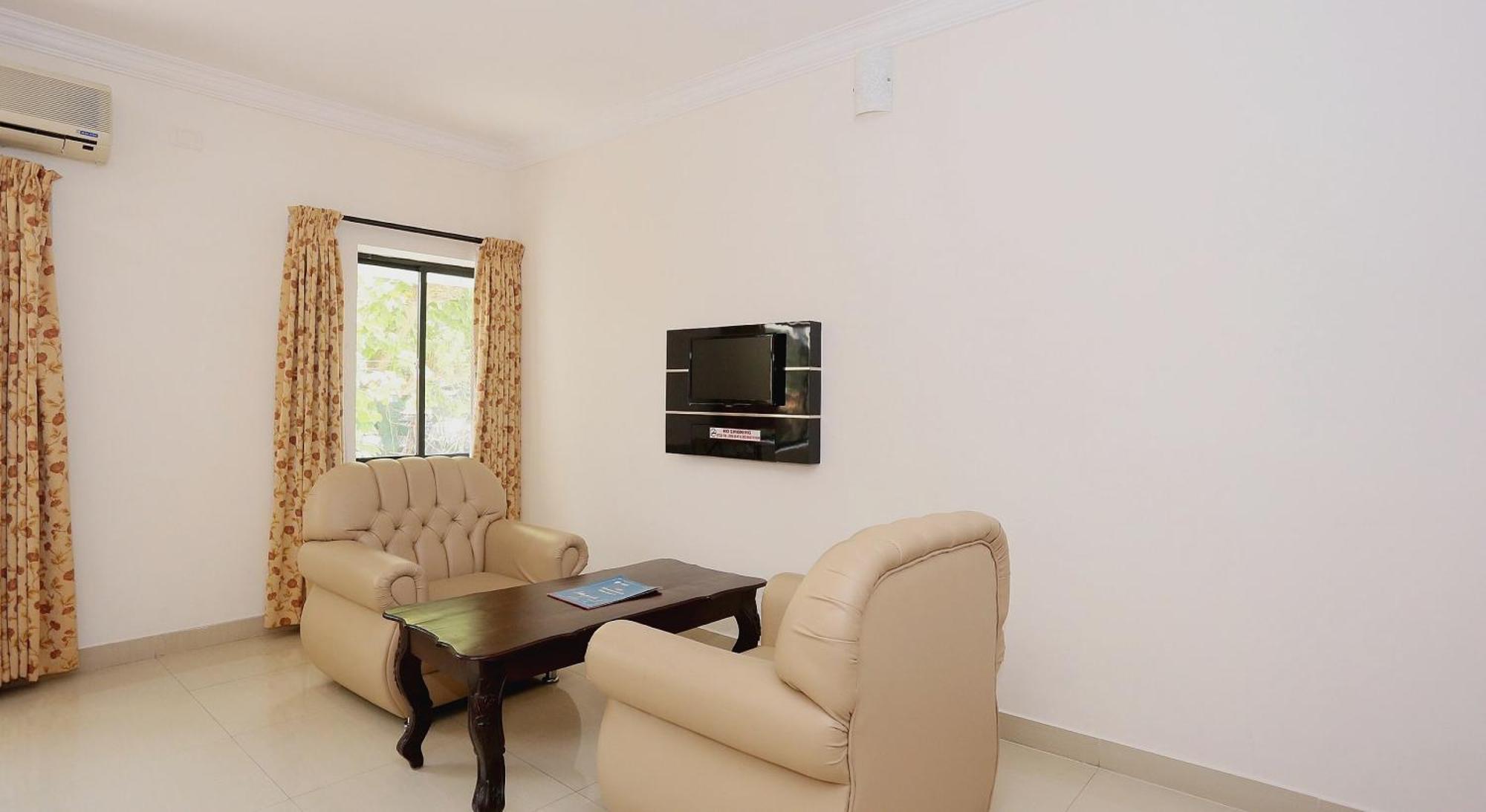 Hotel Super Townhouse Dona Castle à Kollam Extérieur photo