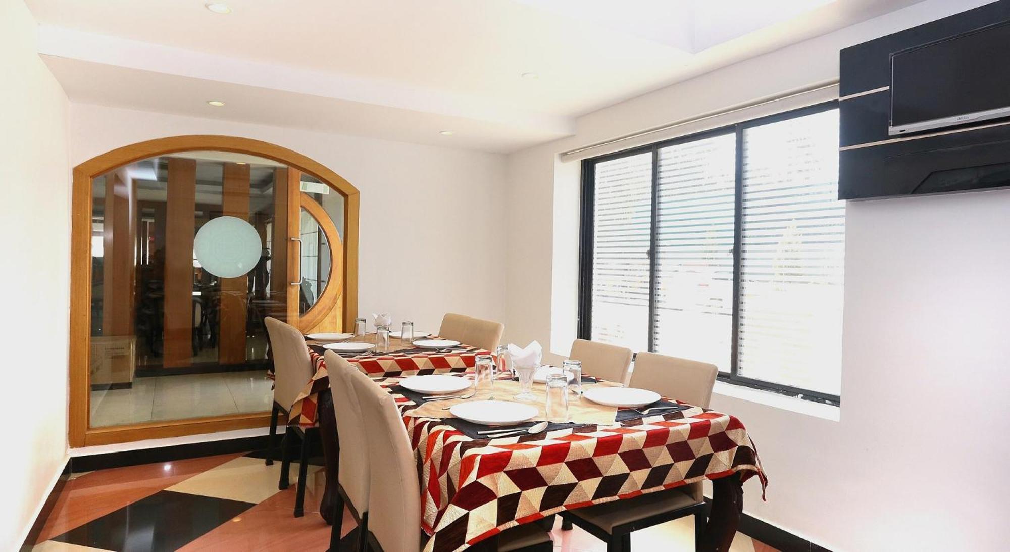 Hotel Super Townhouse Dona Castle à Kollam Extérieur photo